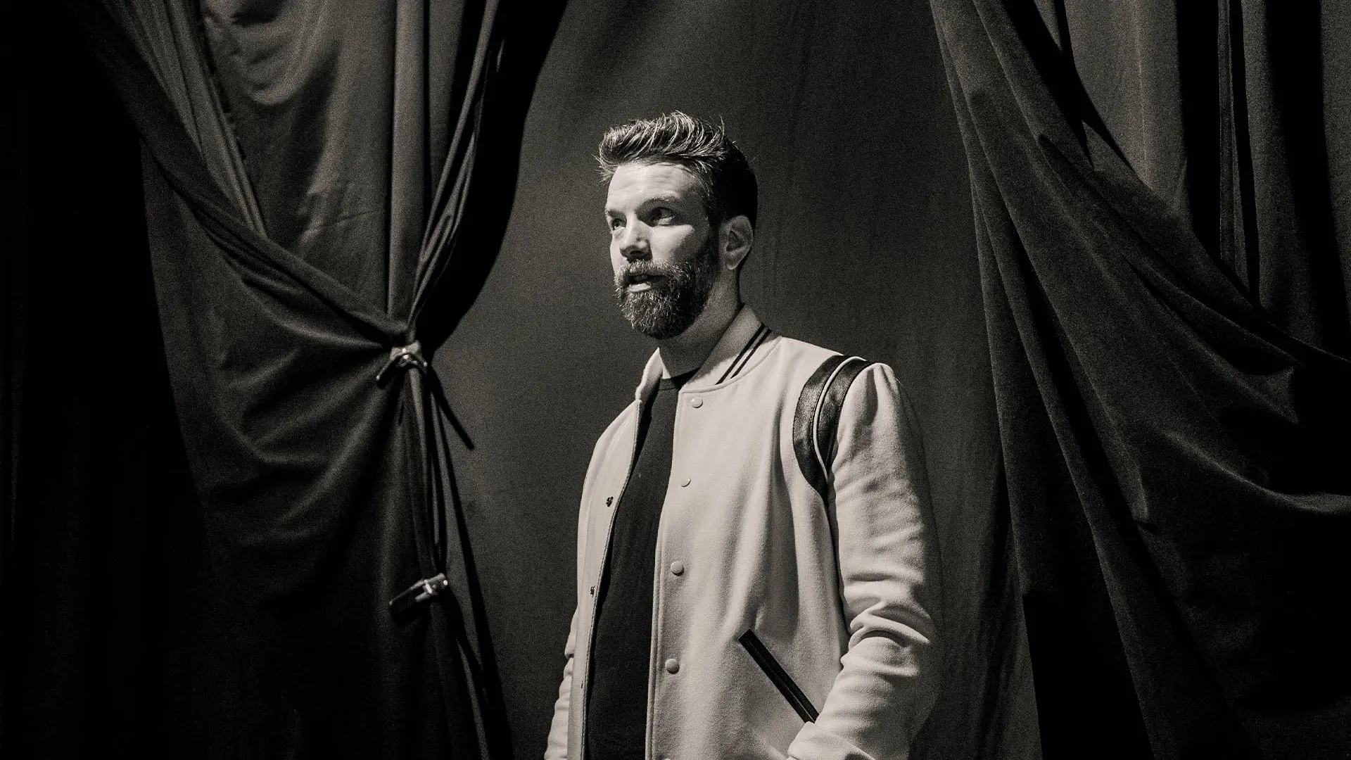 Anthony Jeselnik performing live on stage